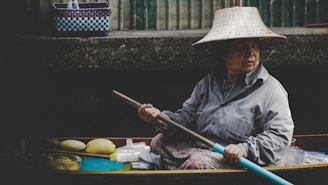 woman in wooden canoe