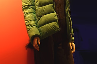 A sleek urban streetwear outfit displayed against a dark, minimalist background with neon green accents.