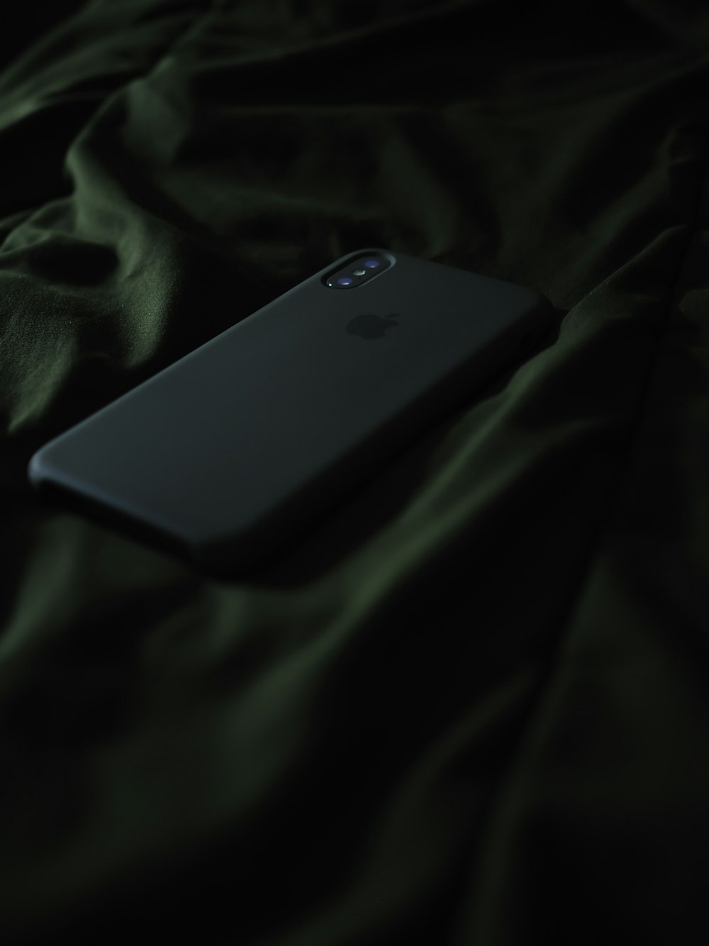 space gray iPhone X with gray case