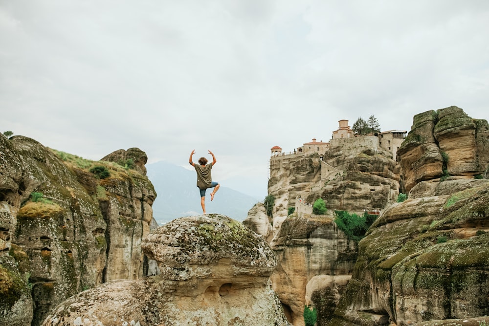 person taking yoga during daytime