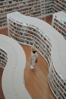 woman standing on bookstore