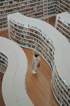 woman standing on bookstore