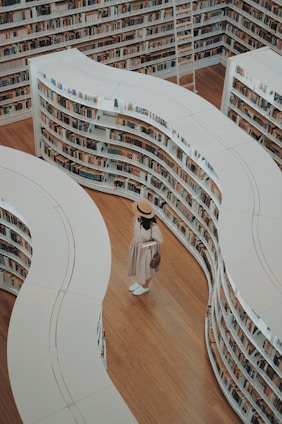 woman standing on bookstore