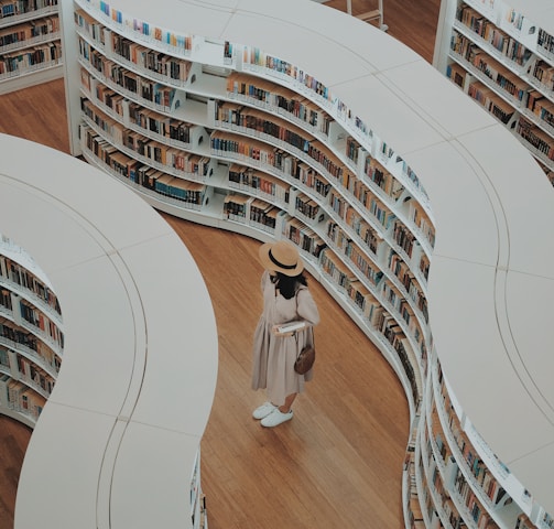 woman standing on bookstore