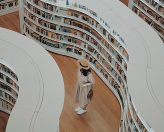 woman standing on bookstore