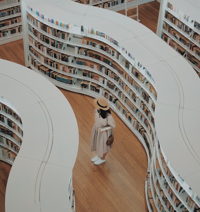 woman standing on bookstore