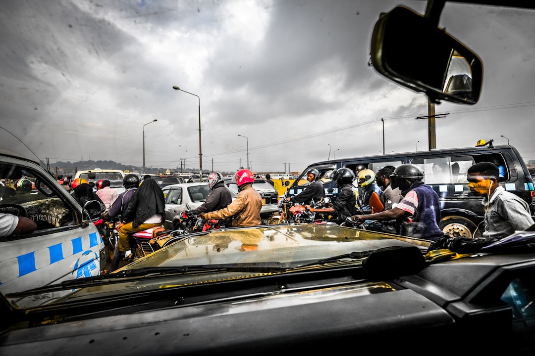 car and motorcycle traffic photo