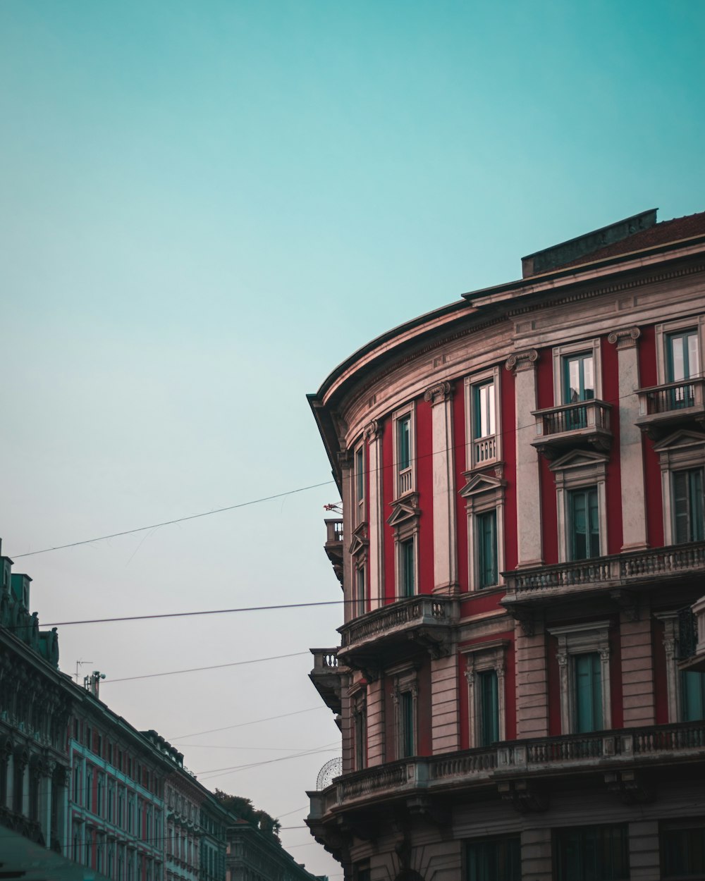 brown and red concrete building photography