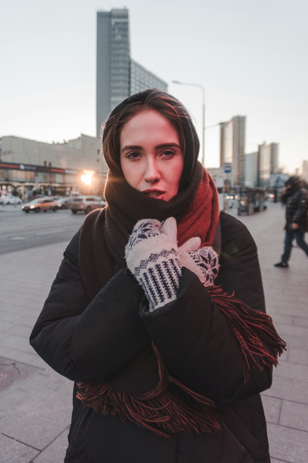 woman holding black scarf