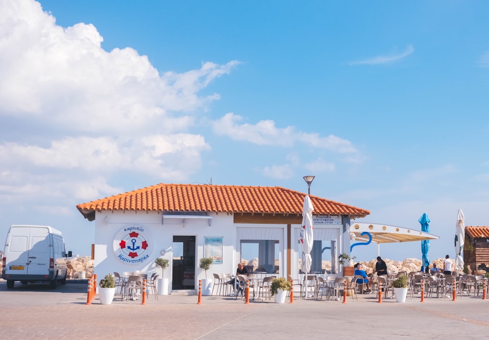 people near eatery during day