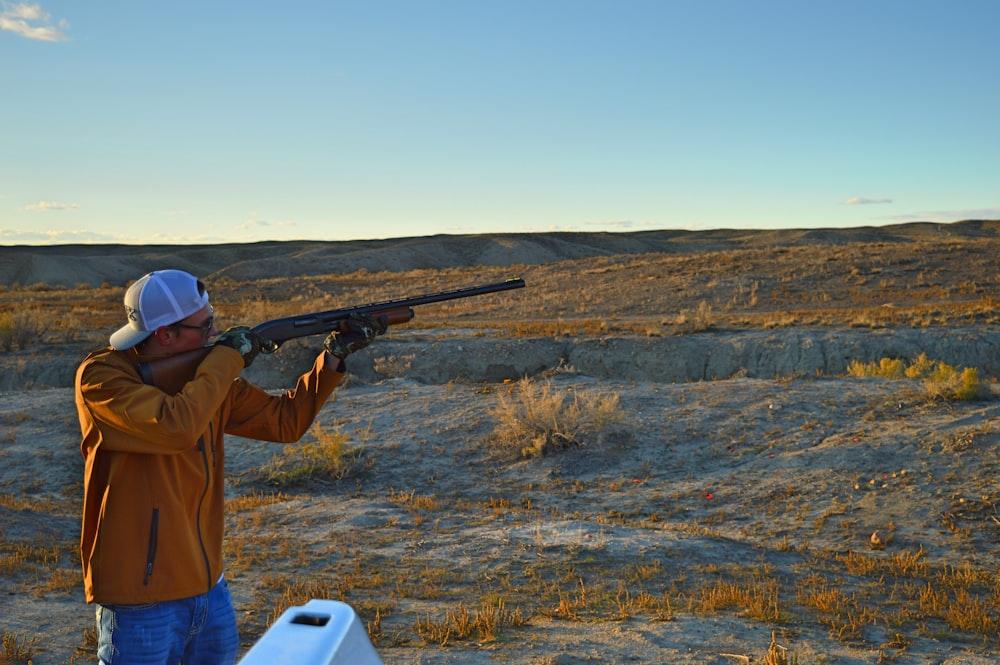 man holding rifle