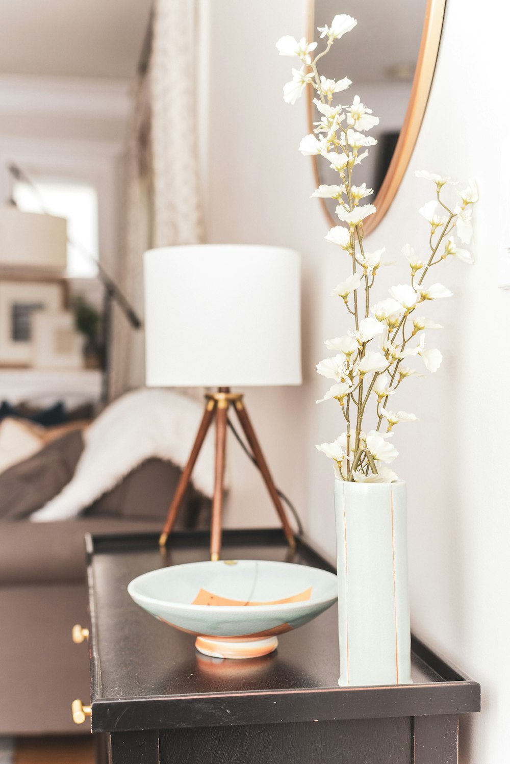 white ceramic bowl on cabinet