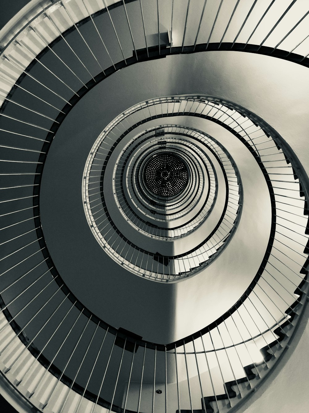 grey metal spiral stairs