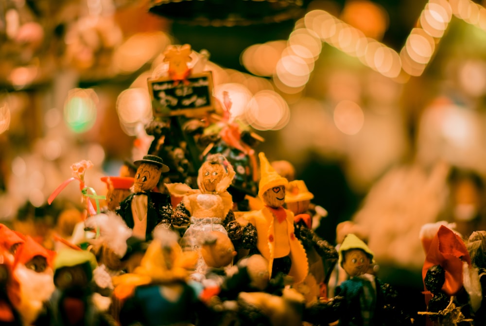 assorted-color figurine collection bokeh photography