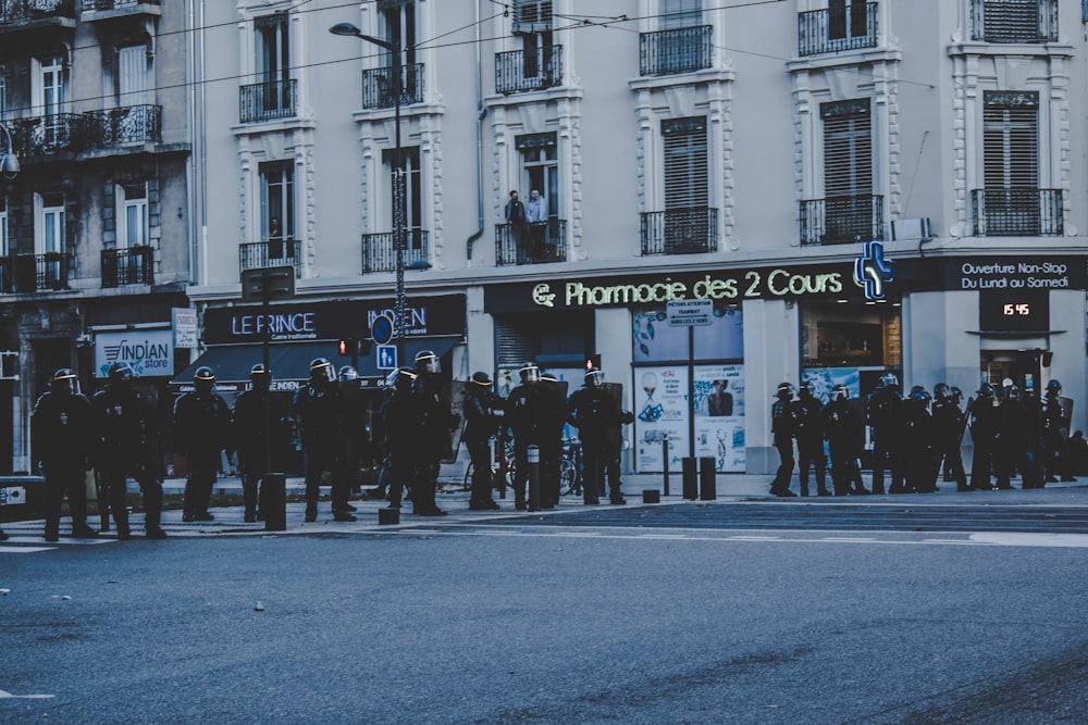 people standing near building