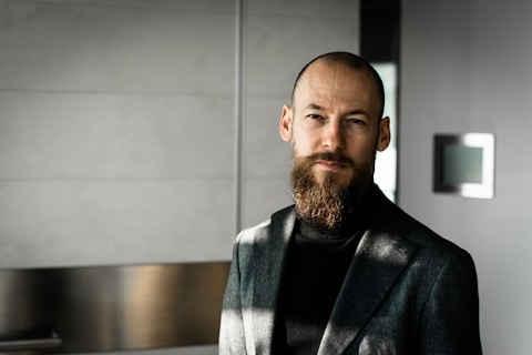 man wearing black blazer