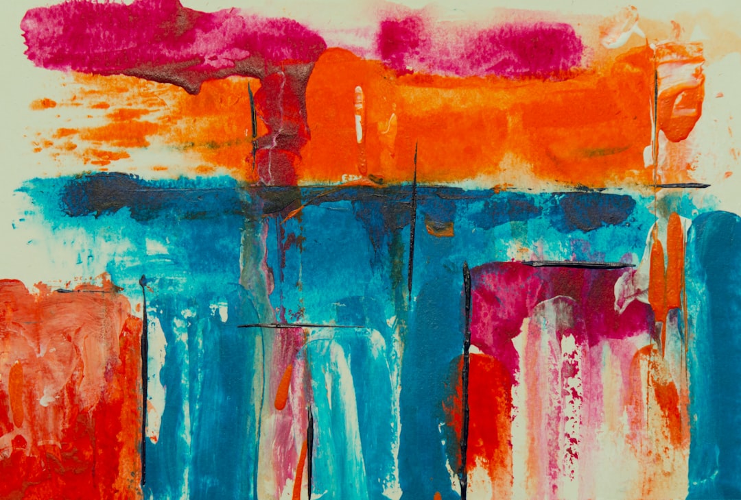 orange, pink, and blue abstract painting