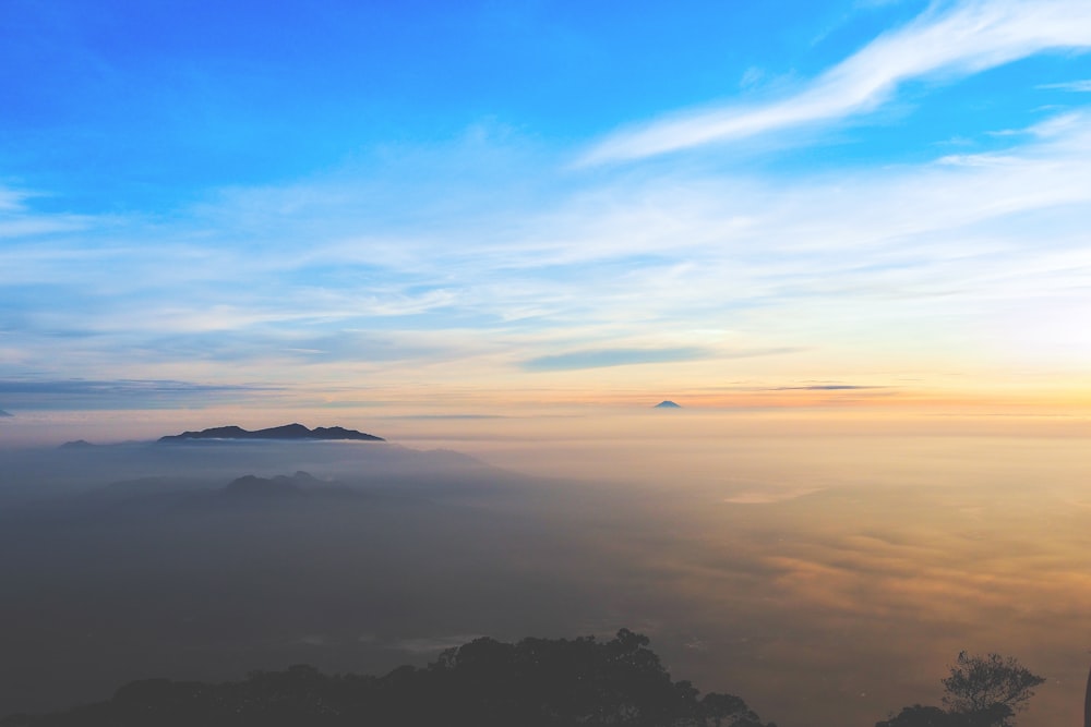 calm sea under clear blue sky during daytime