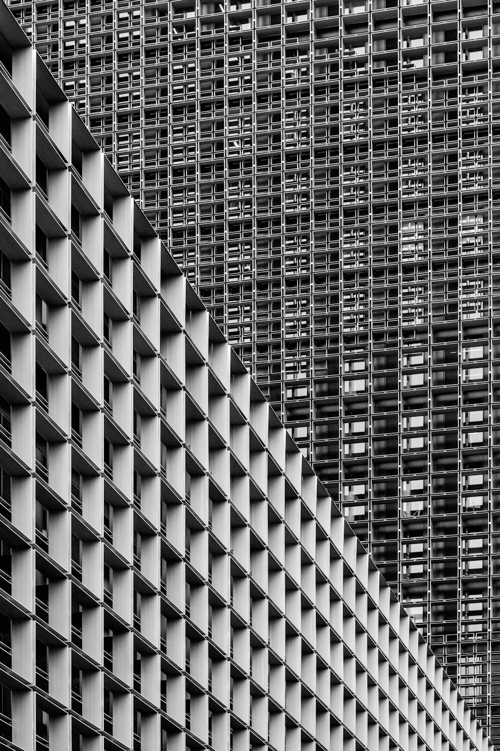 grayscale photography of high-rise buildings