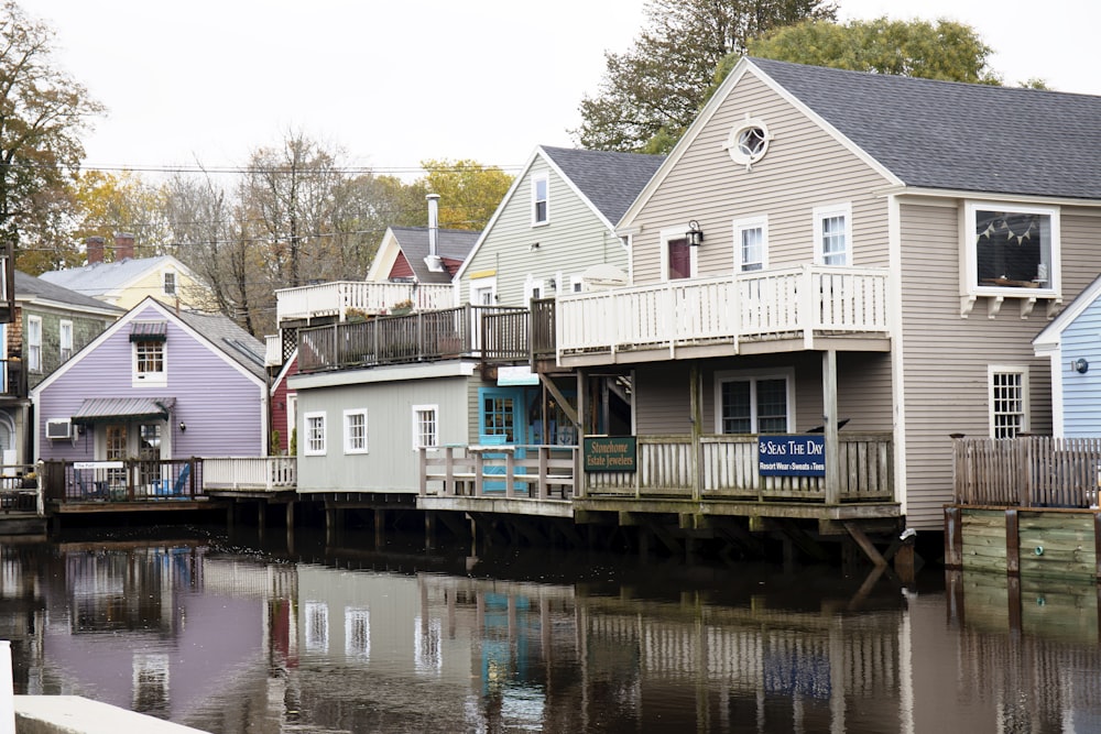 houses beside body of water