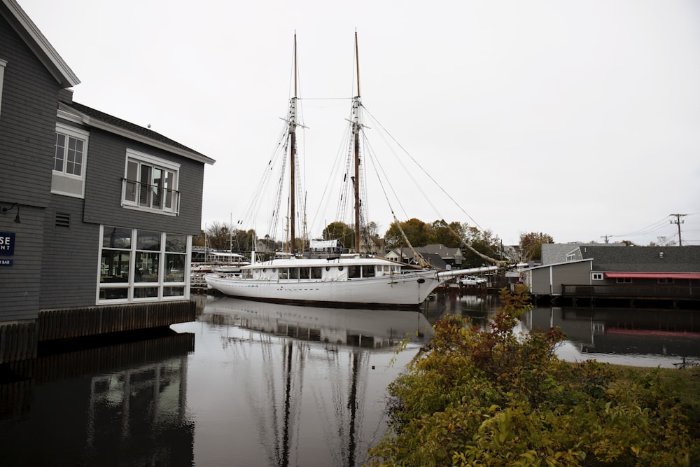 white sailing boat