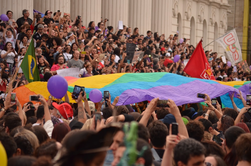 group of people holding flag