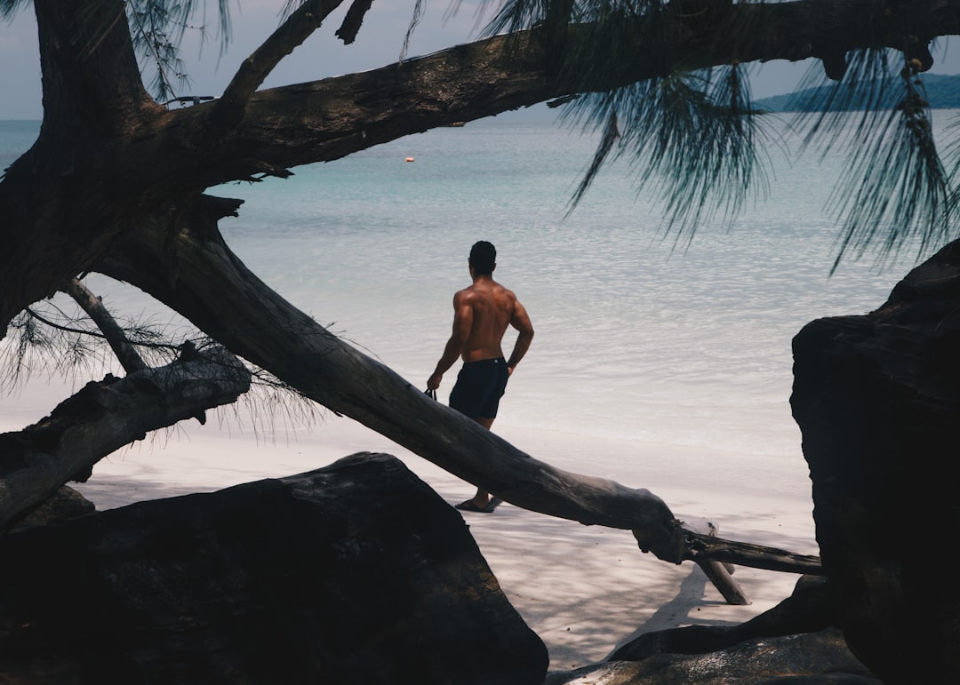 man standing on shore