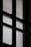 A close-up view of a window with a mesh screen, creating a grid-like pattern that contrasts with the light coming through the glass panes.
