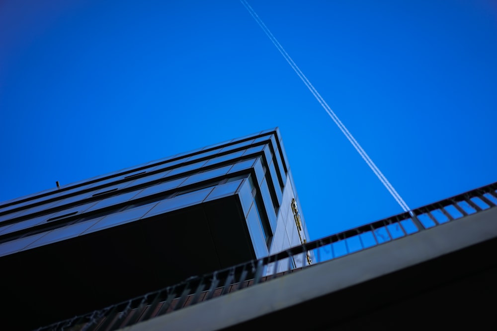 jet vapor streaming on clear blue sky