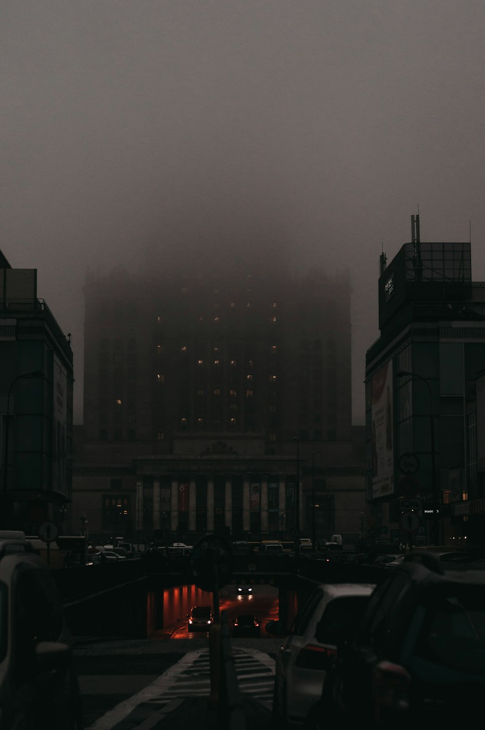 concrete buildings at nighttime