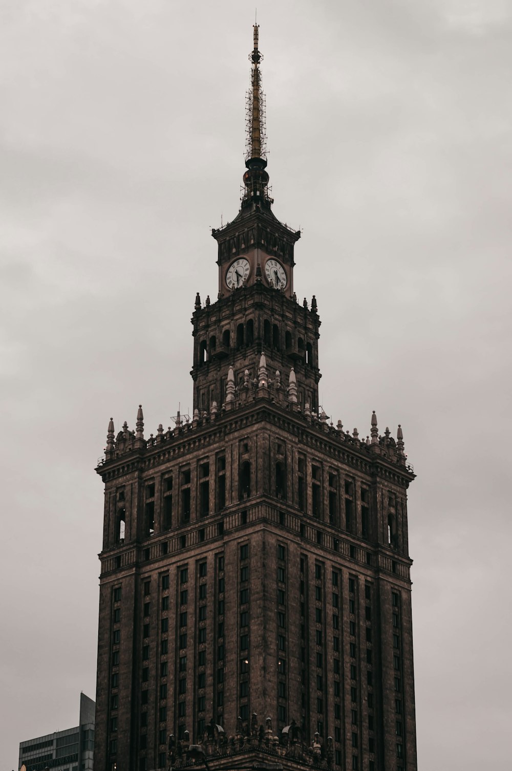 brown concrete tower under white sky during daytime