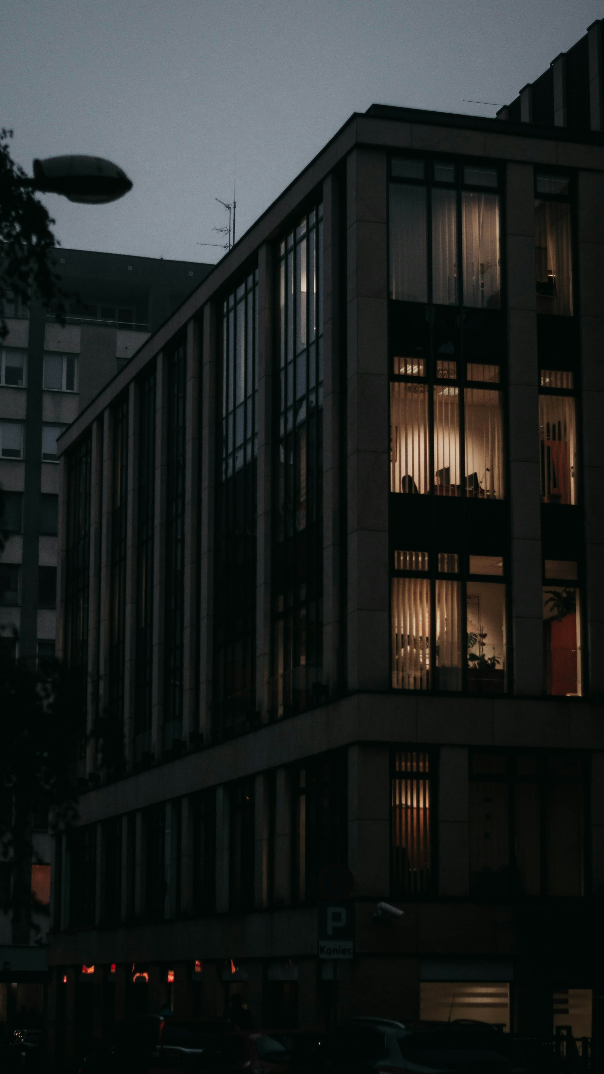 black and brown leather padded tub sofa