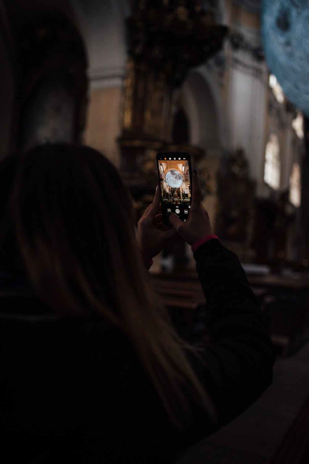 woman holding phone