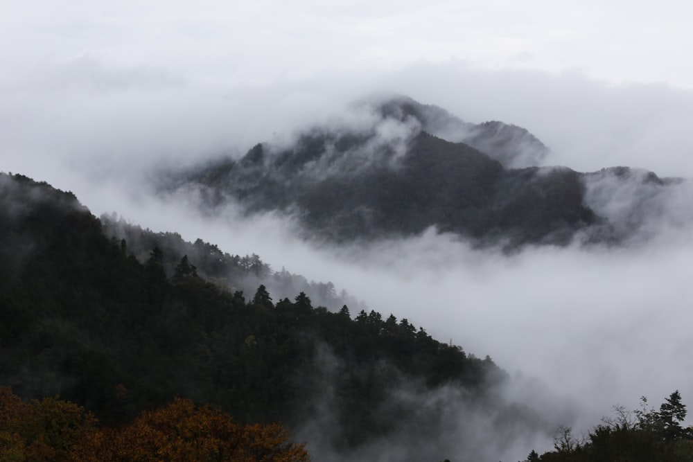 mountain cover with white clouds