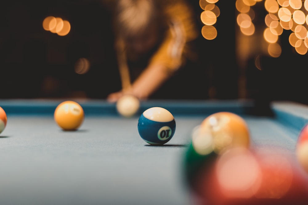 person playing billiard