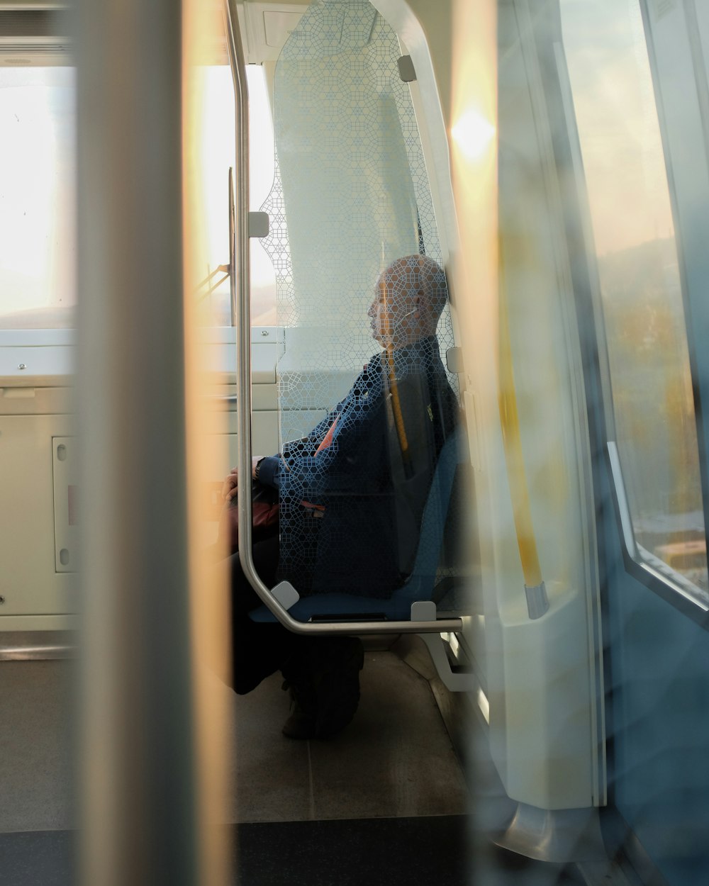 man sitting on vehicle seat