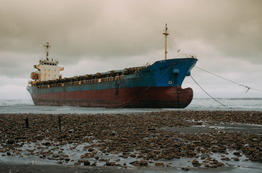 ship on shore during daytime