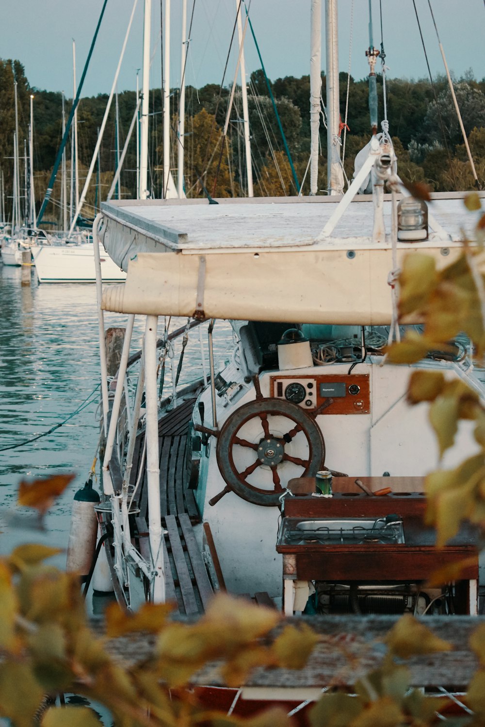 white boat on body of water at daytime