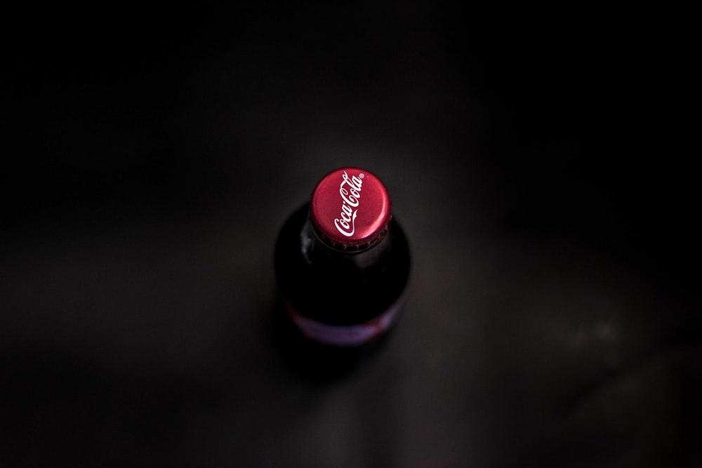 unopened Coca-cola glass bottle