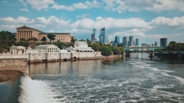 gray concrete building near body of water