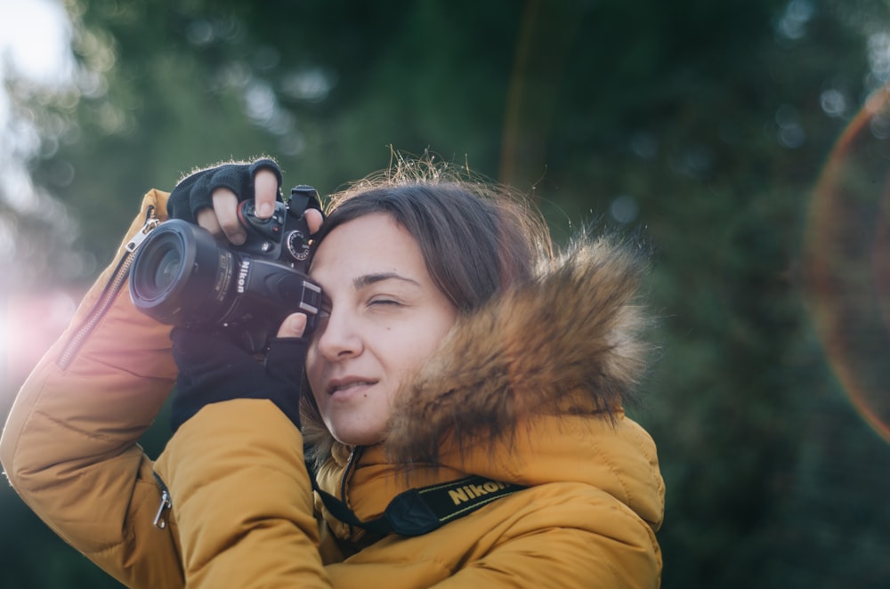 woman holding camera