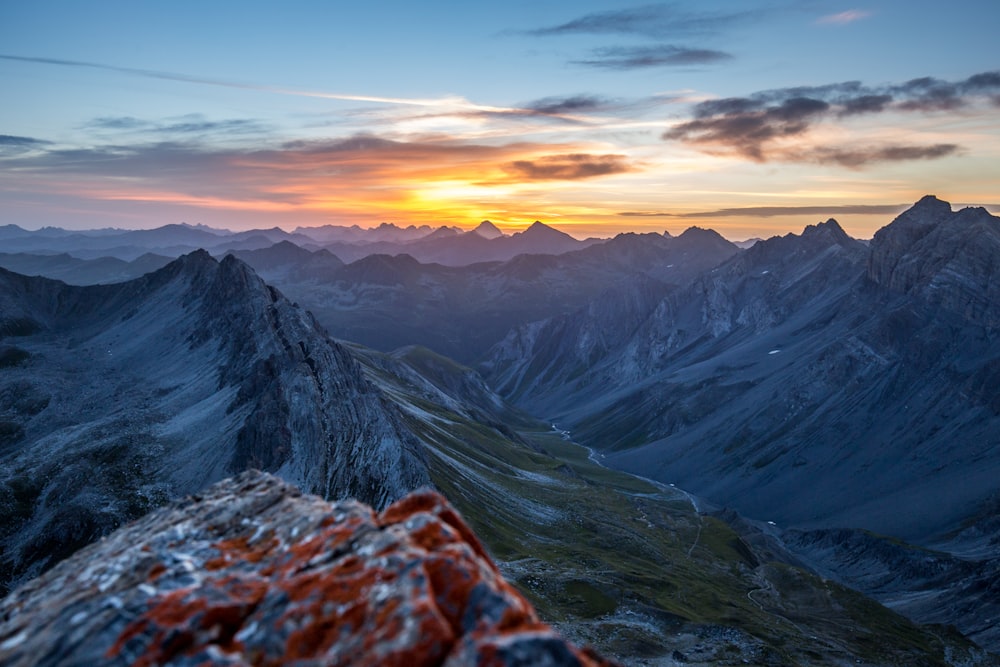 mountain top under sunset