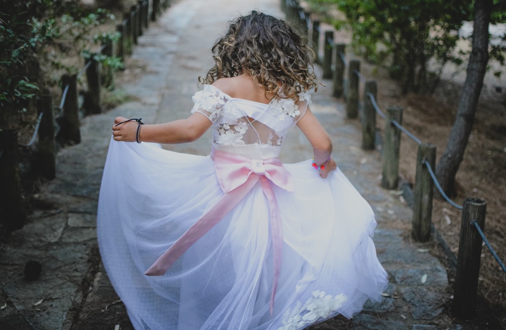 girl wearing white dress