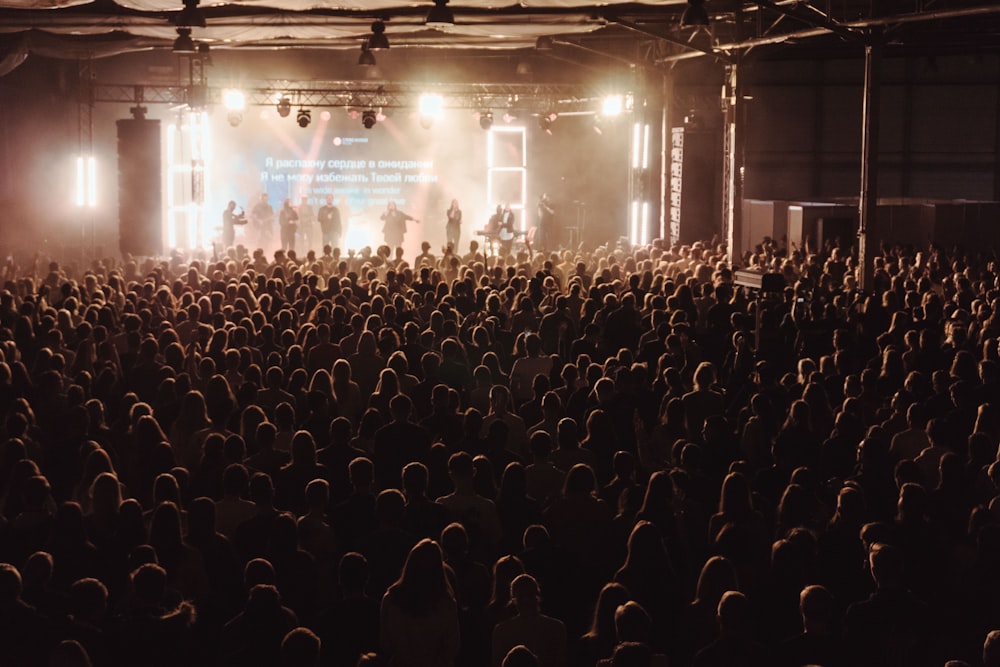 group of people watching concert