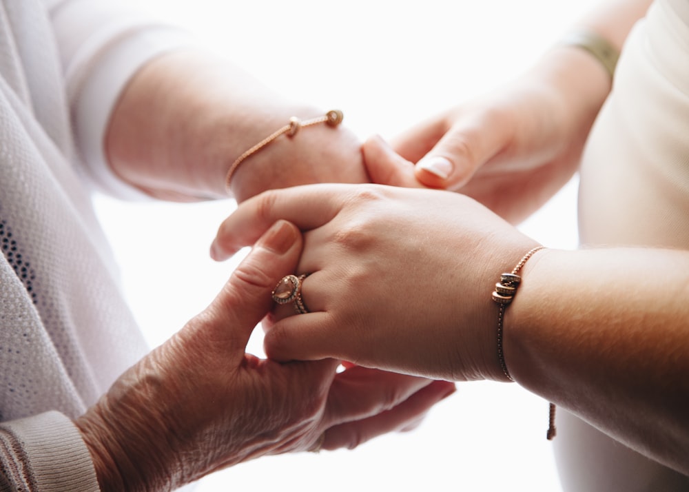 people holding hands