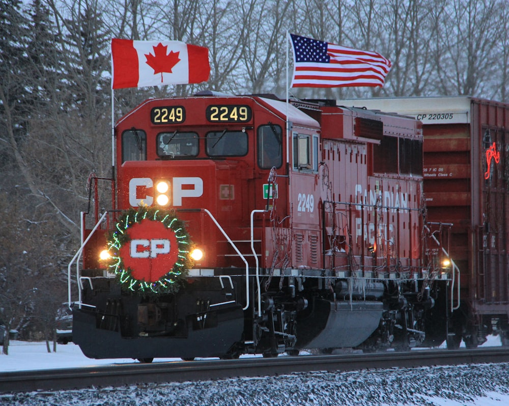red train with Canada and U.S.A. flags