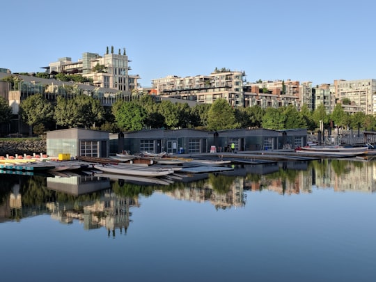 gray boats on body of water in False Creek Canada