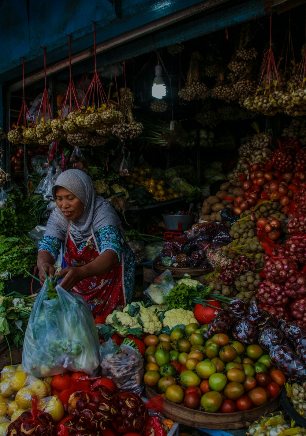 woman holding plastic bag