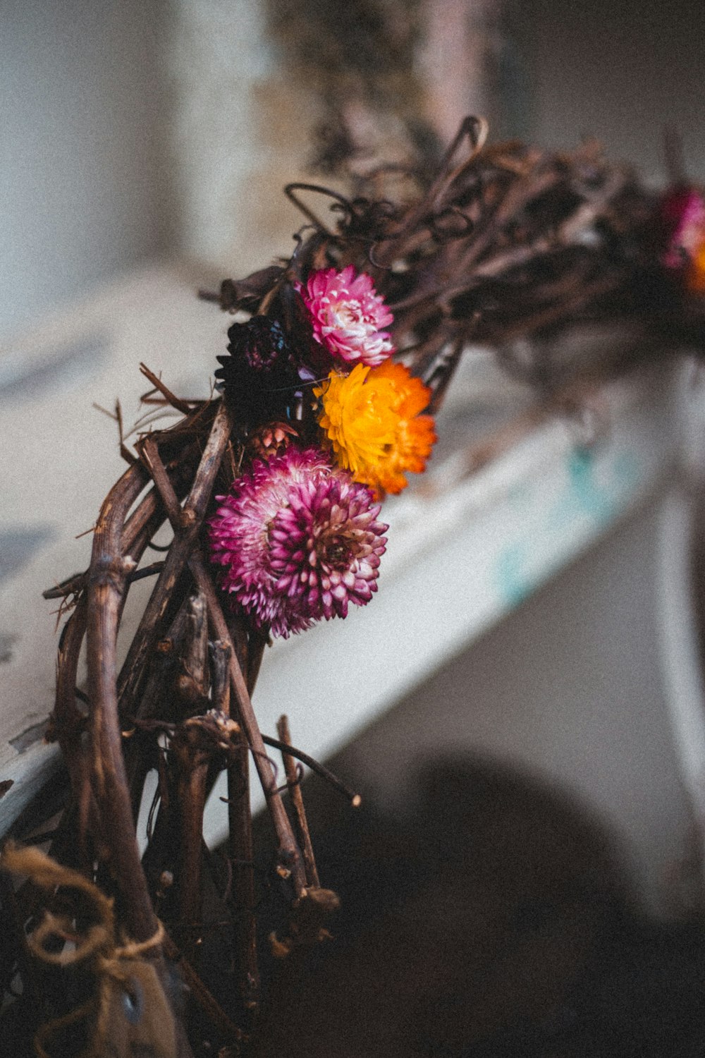 selective focus photography of flower wreath