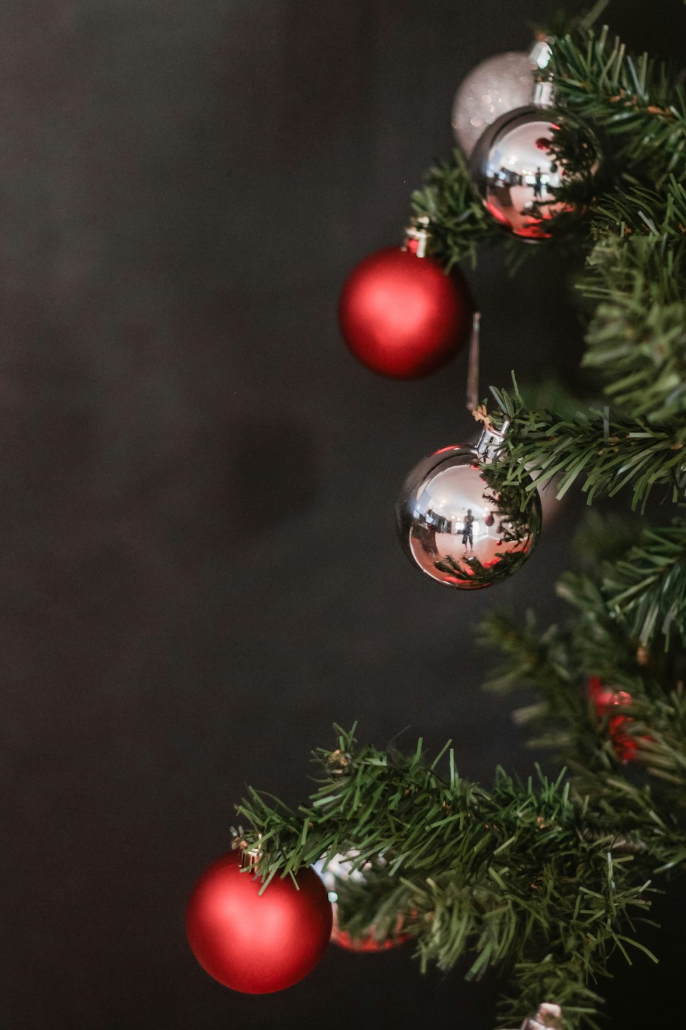 Christmas bauble hanging on Christmas tree